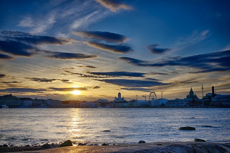 The sun sets over Helsinki